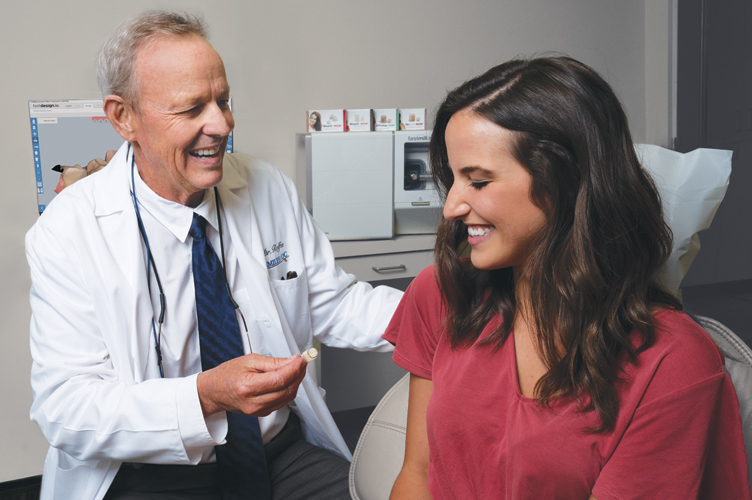 dentist presents zirconia to patient