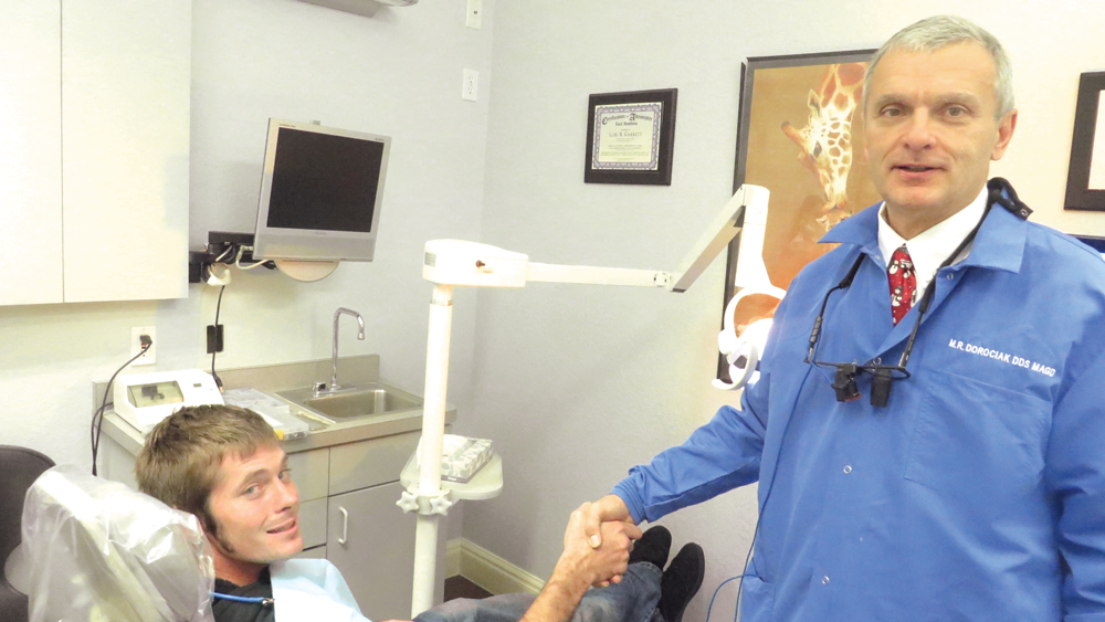 Dr. Dorociak and one of his patients posing together