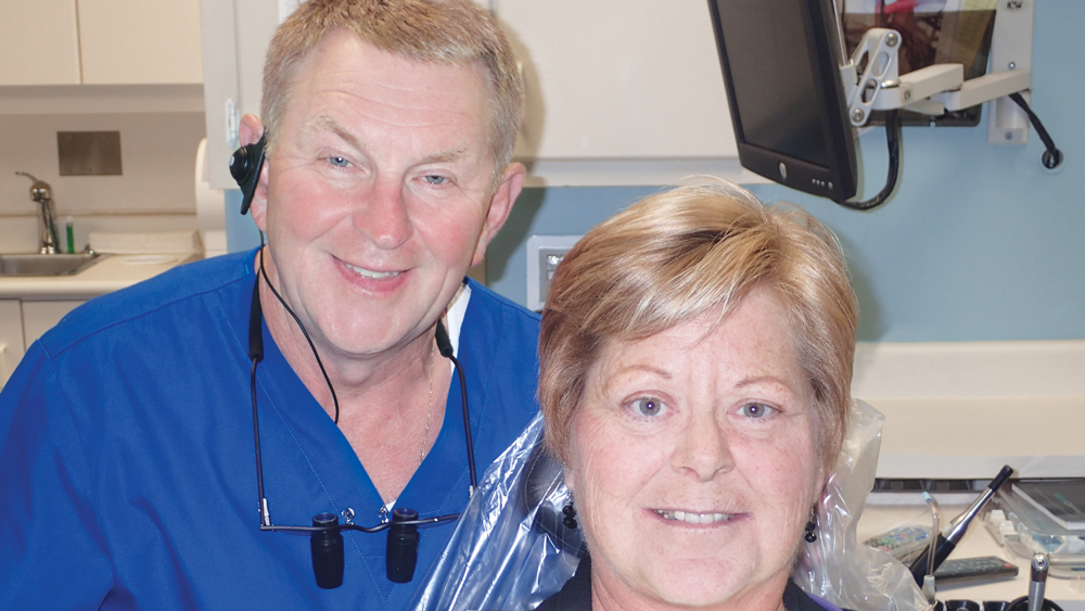 Dr. Connelly completing his first extraction with implant placement case on his sister