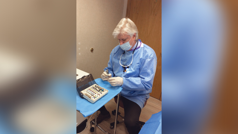 Dr. Kosinski using tools from the Hahn Tapered Implant Guided Surgical Kit