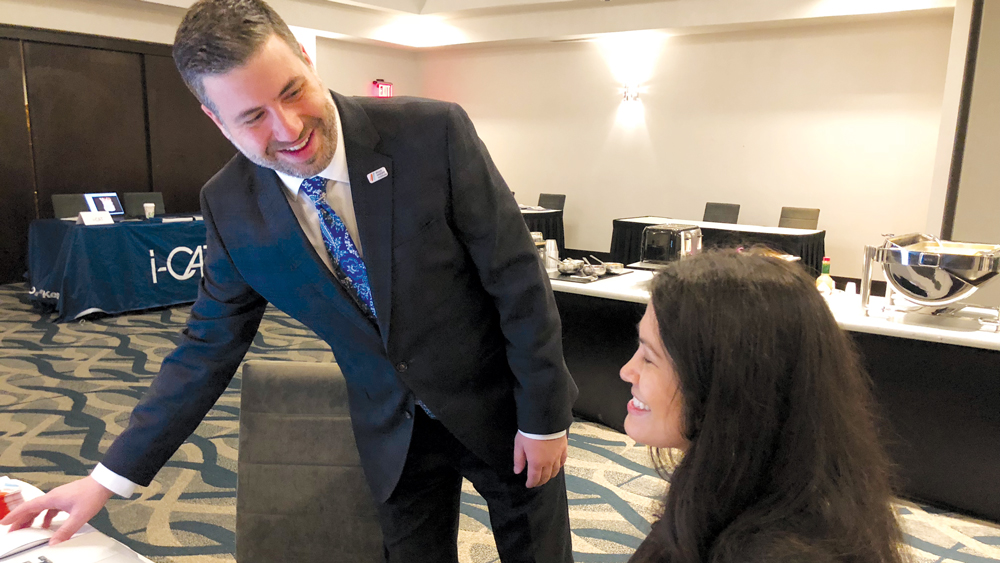 Mark Romano and his associate