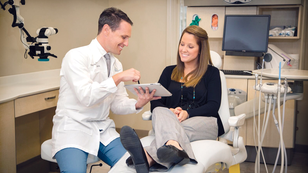 Dr. Cappy Sinclair of Virginia Beach, Virginia, explains the proposed treatment and answers the patient’s questions using digital visual aids