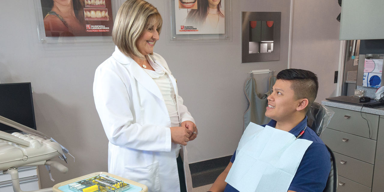 Dr. Anamaria Muresan with patient