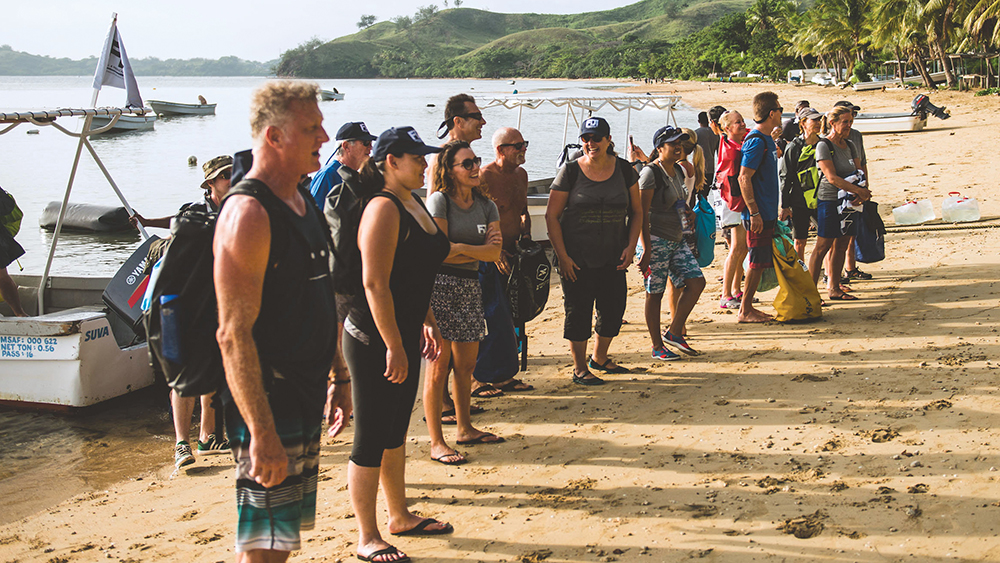 Dr. Greg Herd and a group of volunteers arrive on Malolo Island