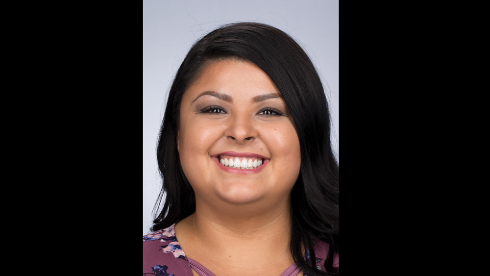 After photo of patient with bruxzir esthetic