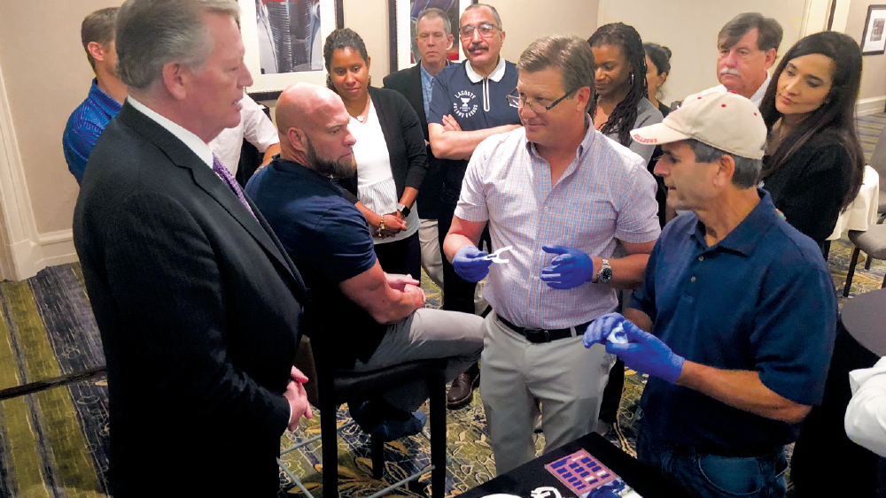 Dr. Tucker teaching strategies to colleagues