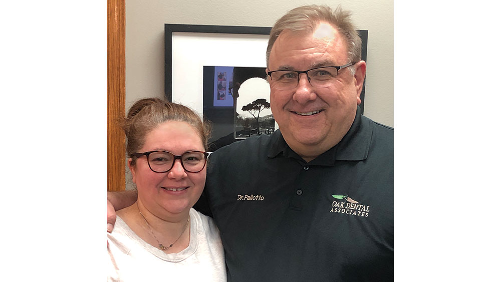 Dr. Pallotto with happy patient