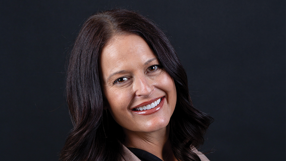 Bobbie Norton smiling after receiving BruxZir Esthetic