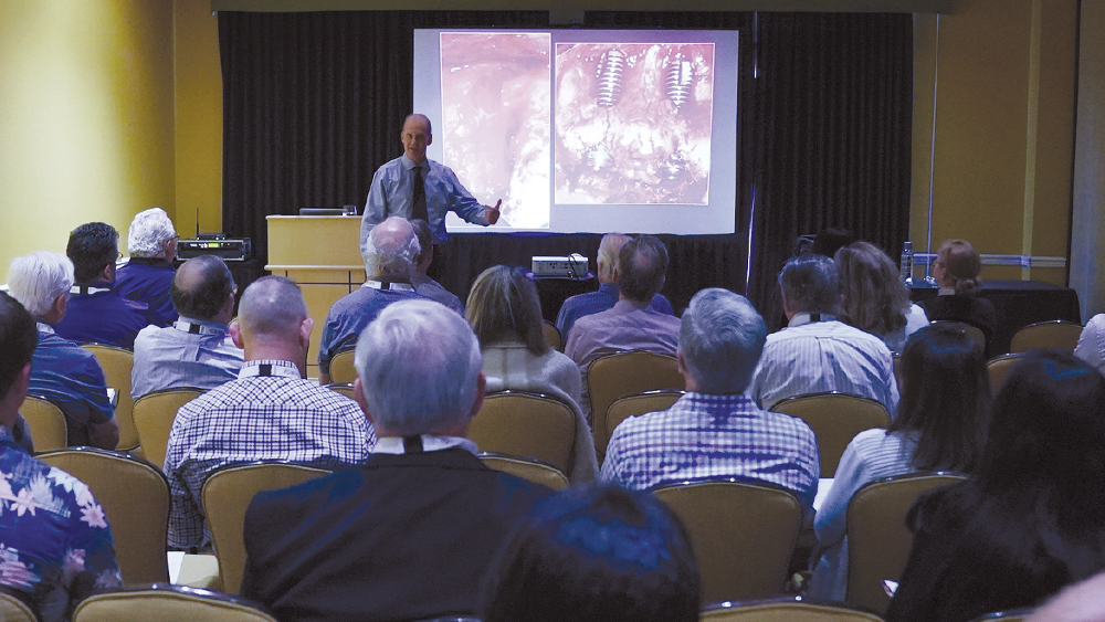 Dr. Resnik teaching attendees about atraumatic extractions