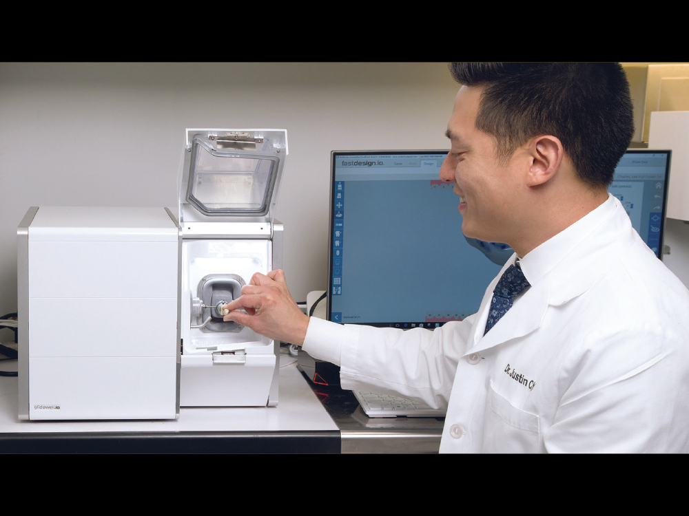 Dr. Justin Chi using the glidewell.io machine CSMV16I1