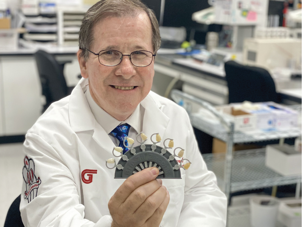 Glidewell R&D employee with the BruxZir Shade Guide