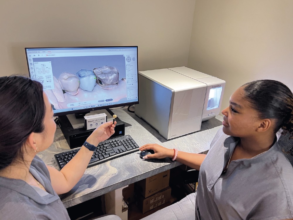 Dental assistants, Kayla Jin (left) and Emelyn Rodriguez (right)