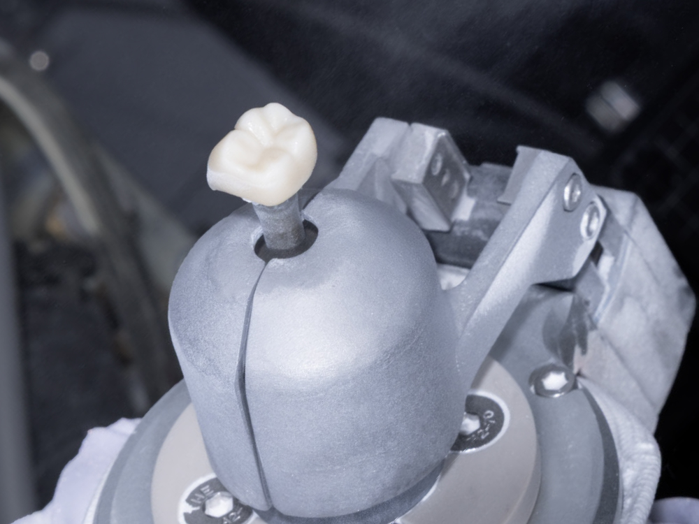 Operators deliver the sintered restorations to finishing and quality control