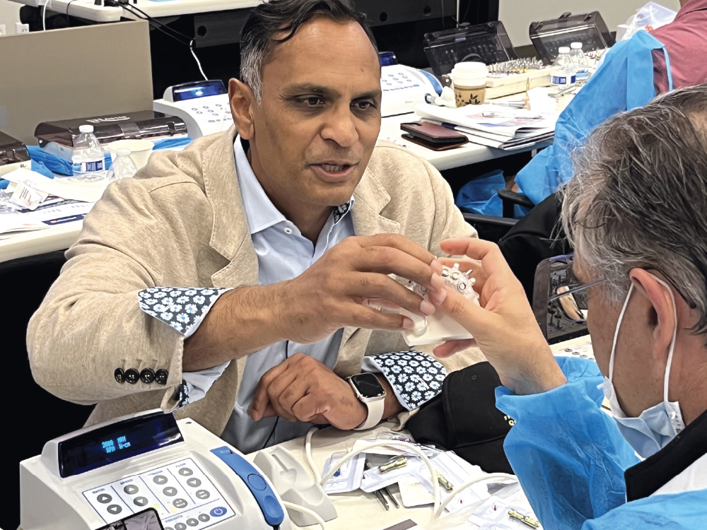 Dr. Paresh Patel guides attendees through the hands-on exercises with personalized instruction.