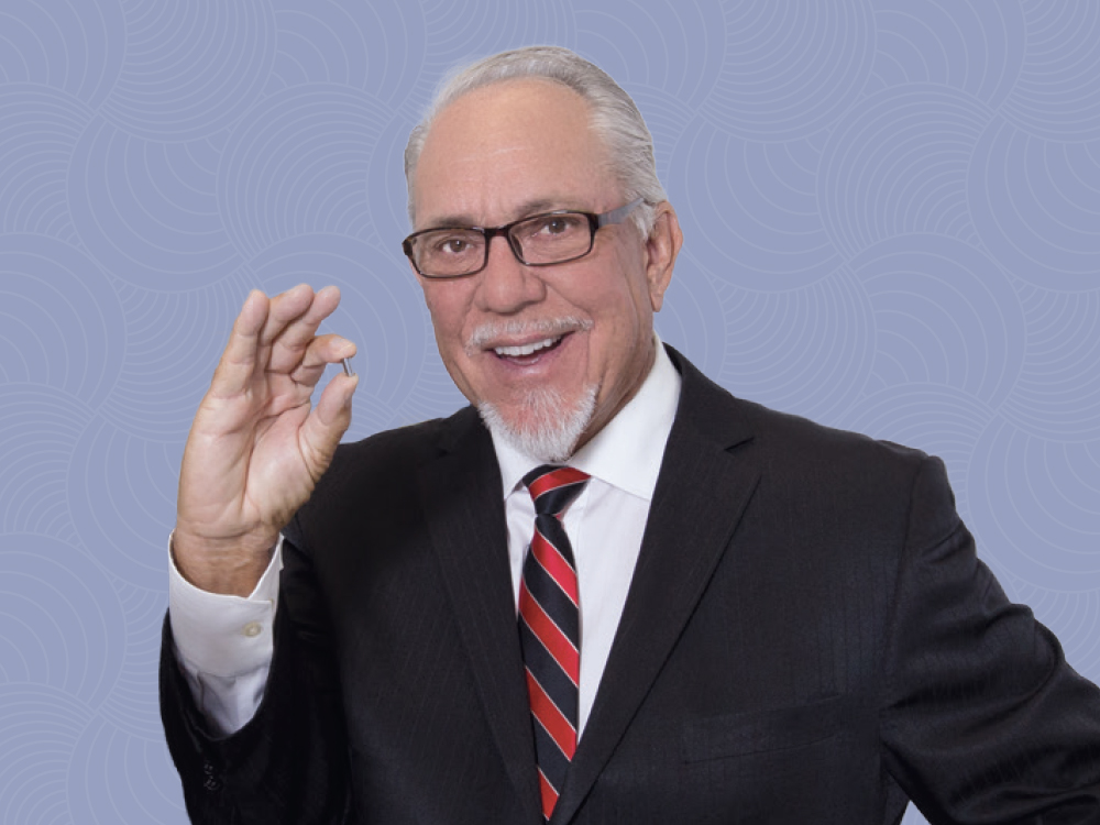 Mr Jim Glidewell with implant part