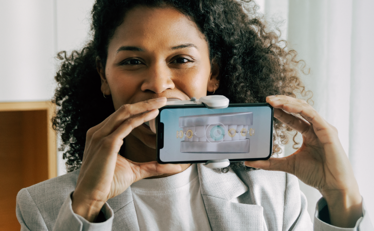 Woman using the ScanBox Pro with phone